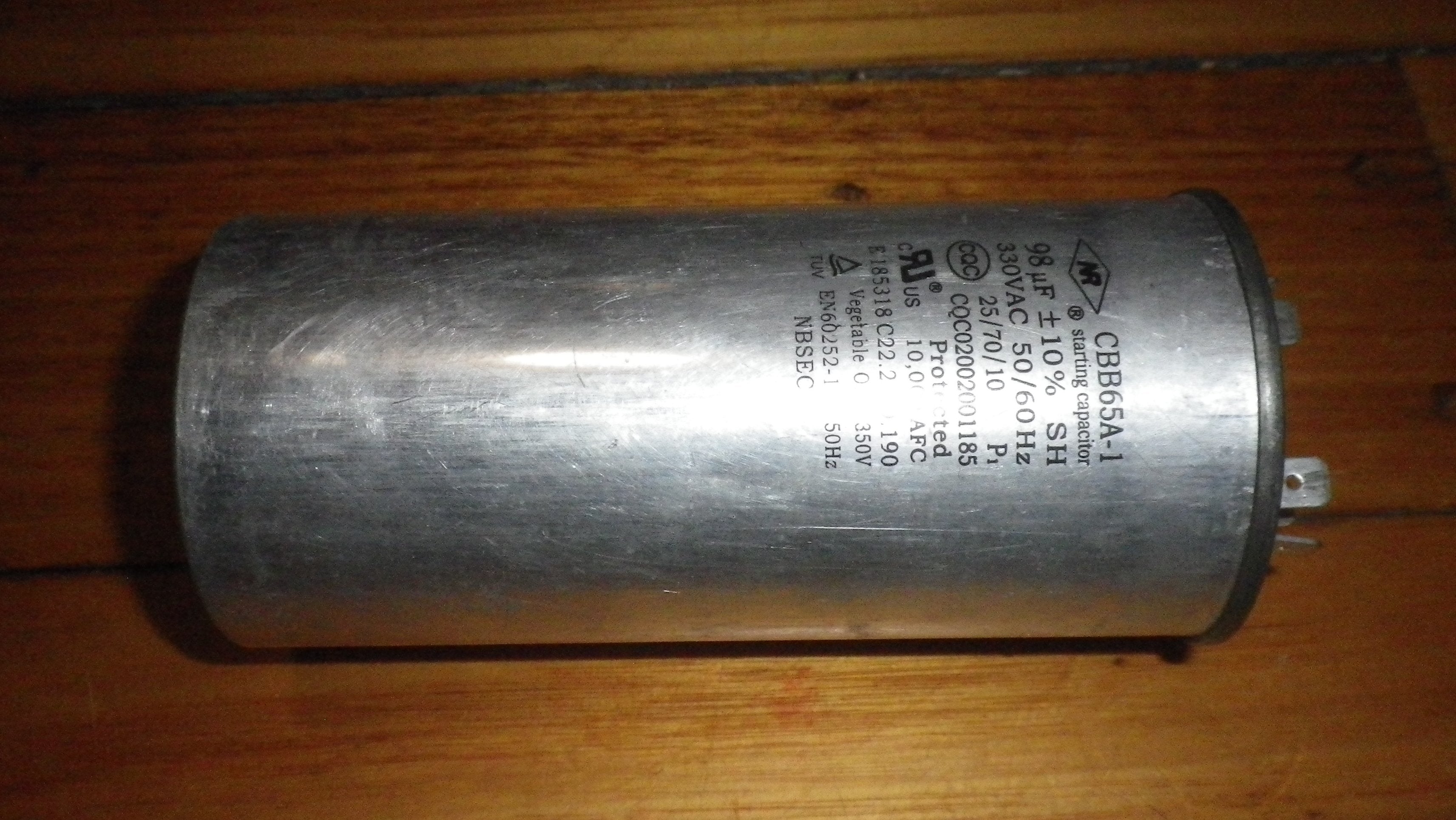 Pre-owned 98 Microfarads (uF) 330 Volt Metal Can Type Motor Start and Run Capacitor - Part # CAP98