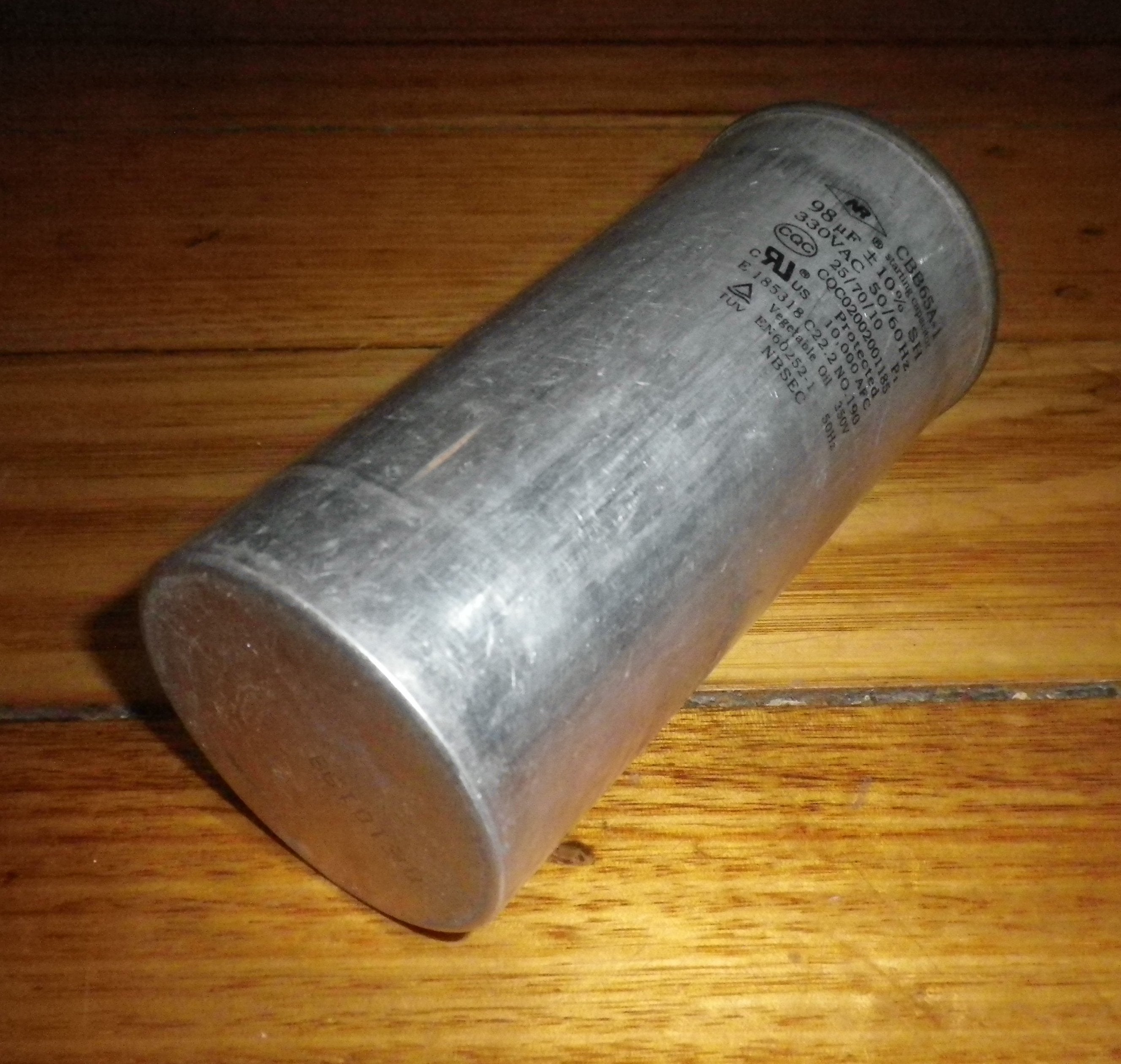 Pre-owned 98 Microfarads (uF) 330 Volt Metal Can Type Motor Start and Run Capacitor - Part # CAP98