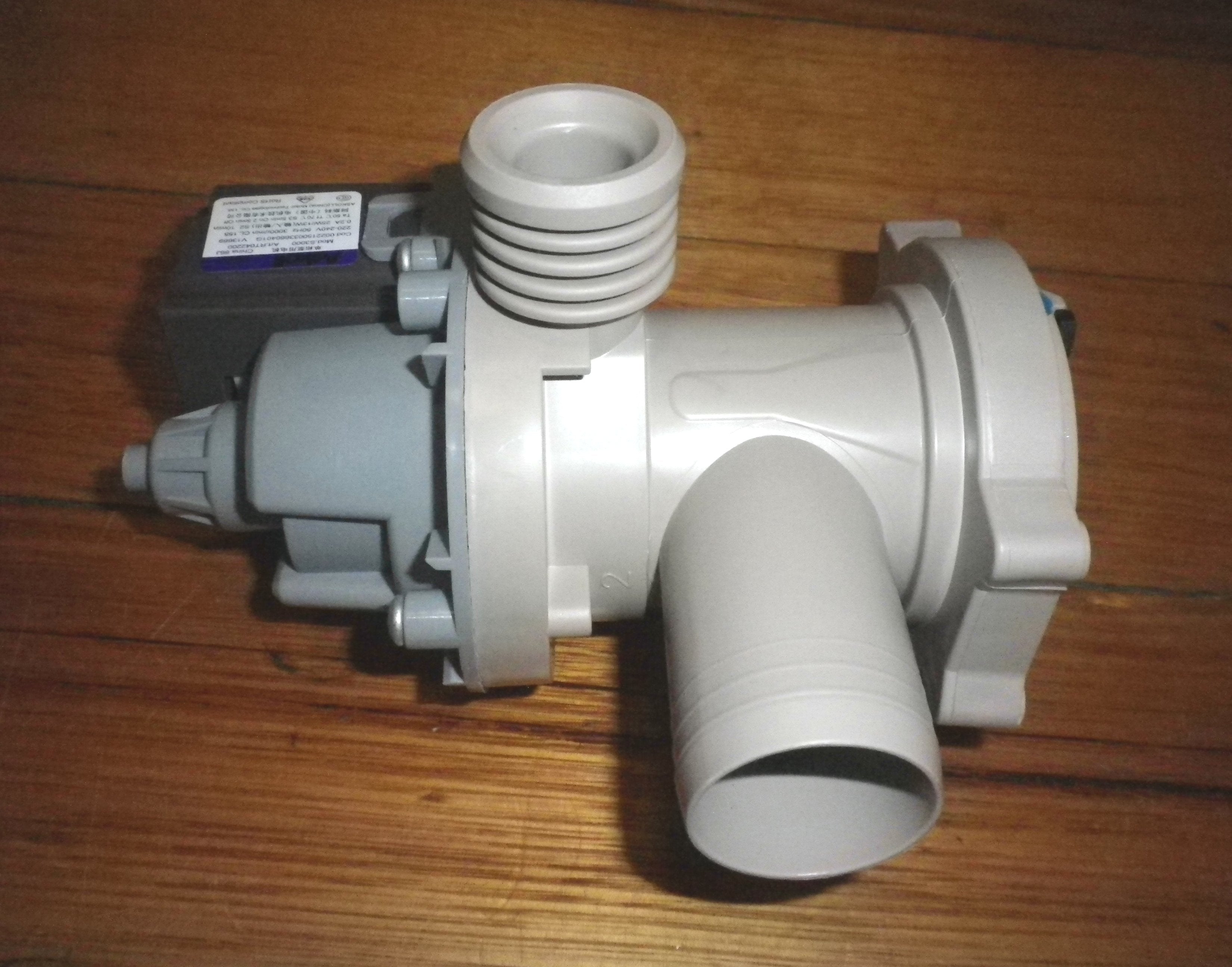 Haier Complete Front Loader Washing Machine Electric Pump Assembly - Model WH7560J1, Part # H0022150033660401G