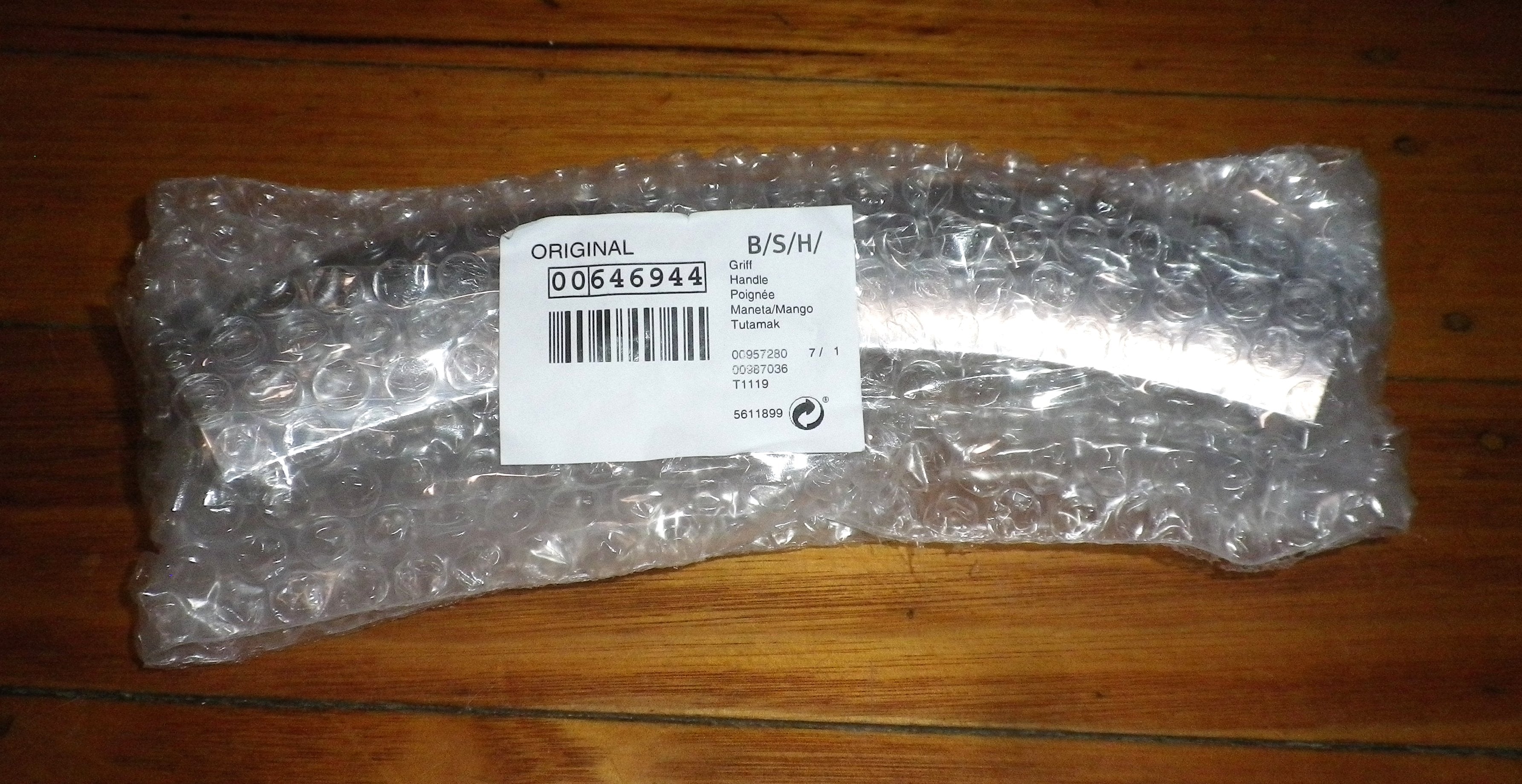 Chrome-Colored Door Handle for Siemens IQ500 Clothes Dryer - Part # 646944