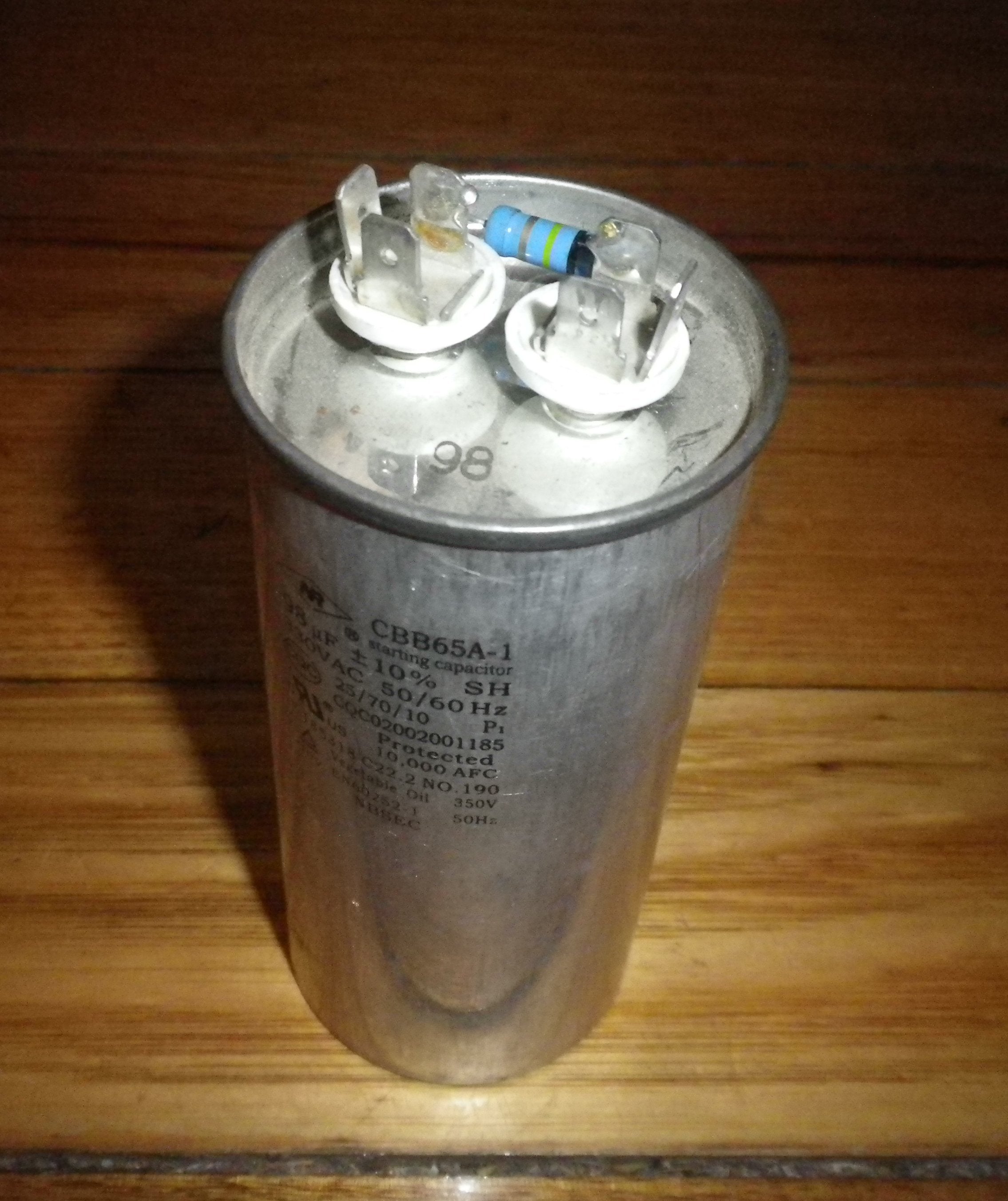 Pre-owned 98 Microfarads (uF) 330 Volt Metal Can Type Motor Start and Run Capacitor - Part # CAP98