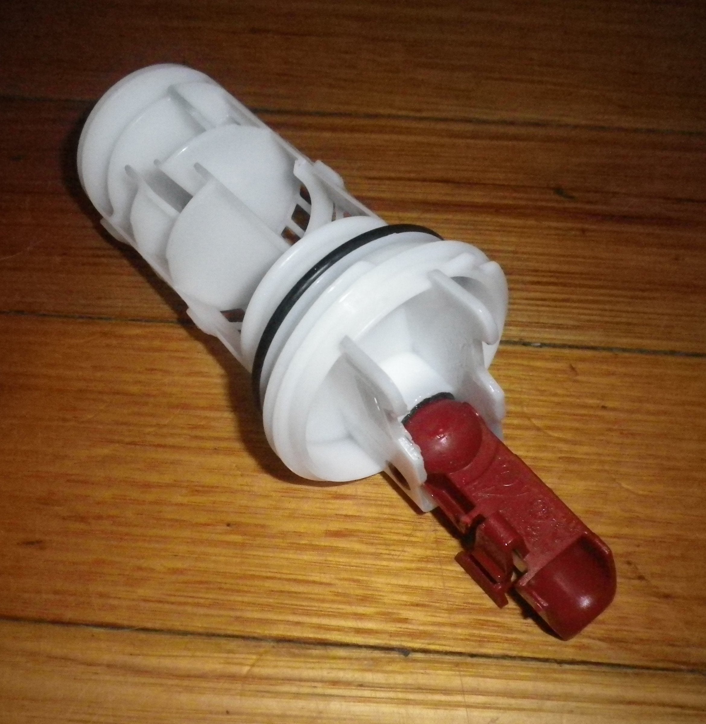 AEG and Electrolux Front Loader Washing Machine Pump Lint Filter and Button Trap Insert - Genuine Replacement Part # 140040243028