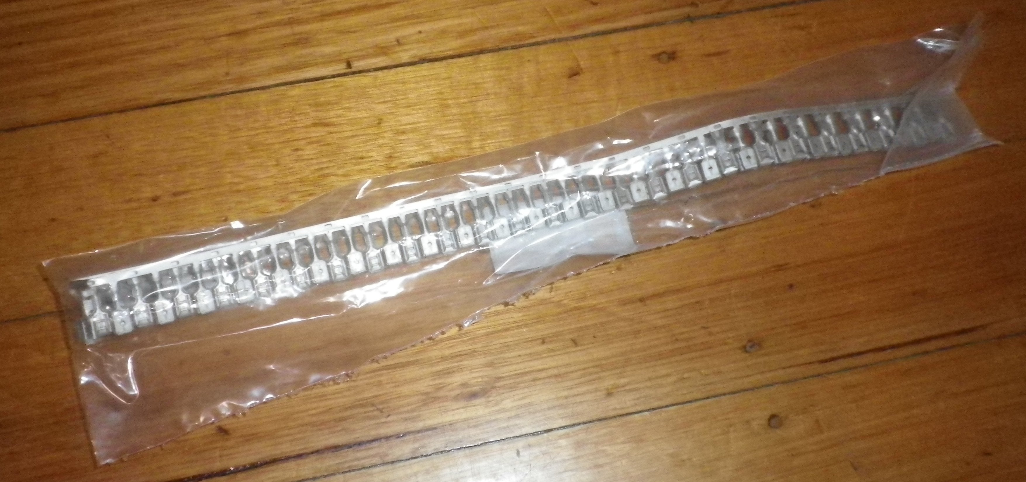 50-Piece Strip of 6.35mm Uninsulated Piggyback Spade Terminals - Part # 61944-2-50