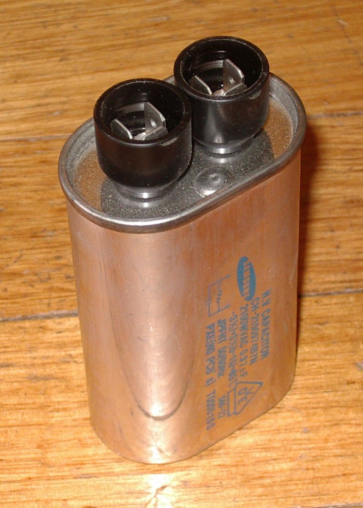 Samsung High Voltage Microwave Oven Capacitor with 0.97 Microfarads and 2100 Volts - Part Number MWC97