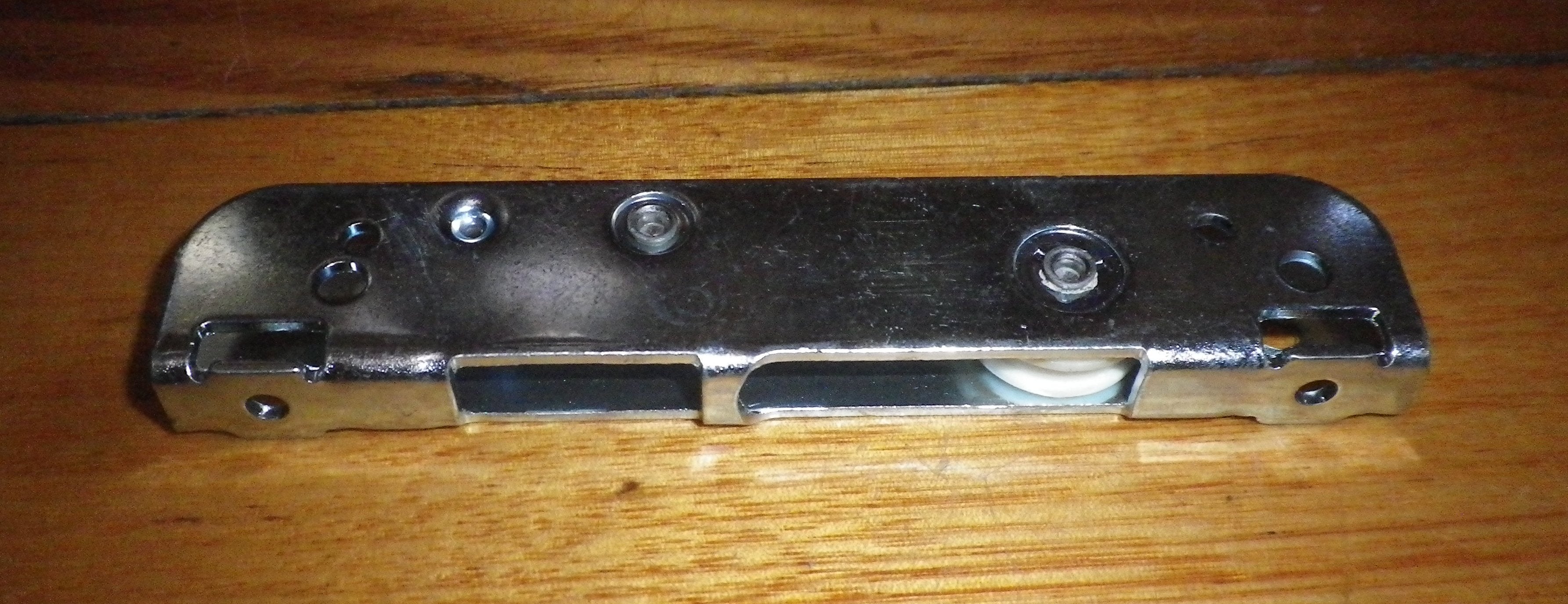 Ariston, Whirlpool Oven Door Hinge Support Bracket - Genuine Parts A033337, 482000026242