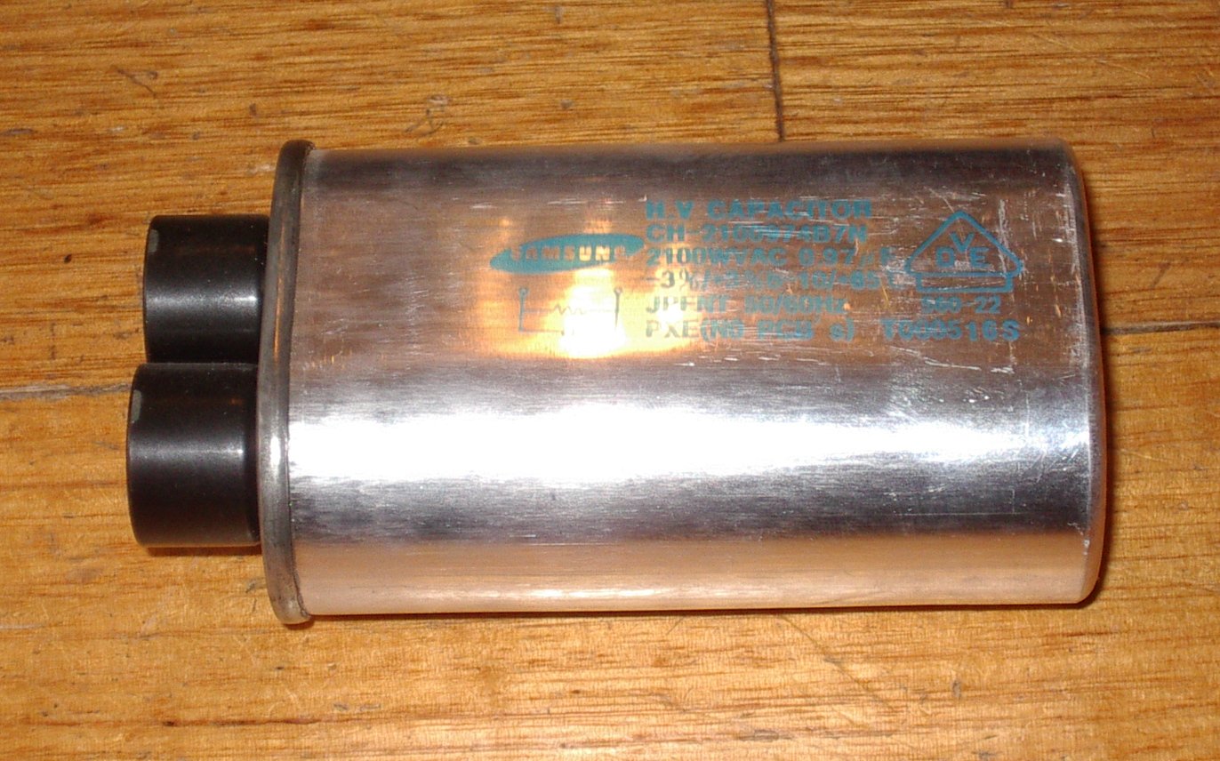 Samsung High Voltage Microwave Oven Capacitor with 0.97 Microfarads and 2100 Volts - Part Number MWC97
