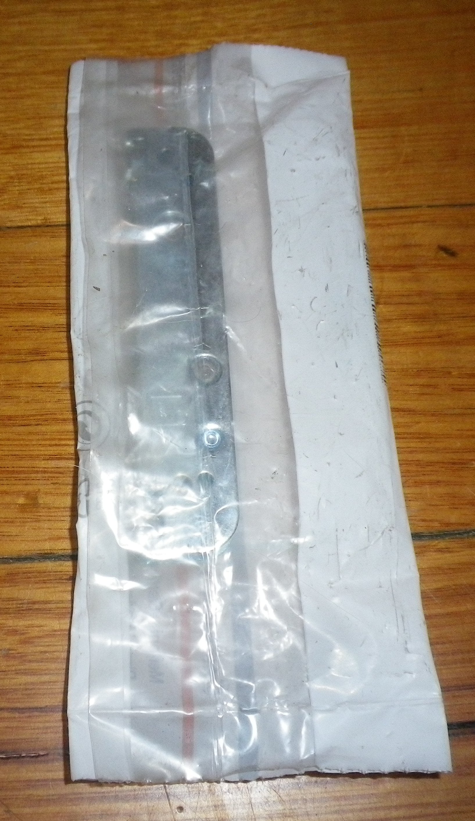 Ariston, Whirlpool Oven Door Hinge Support Bracket - Genuine Parts A033337, 482000026242
