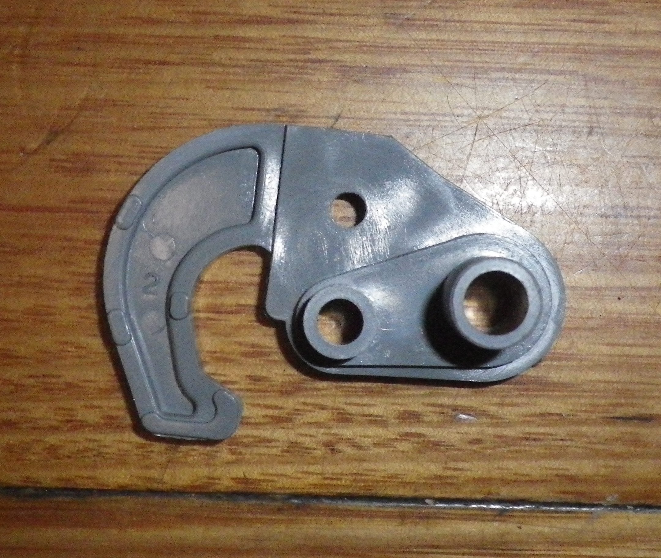 Fisher & Paykel 525 Series Grey Fridge Left-Hand Door Closing Hook - Part FP813574P