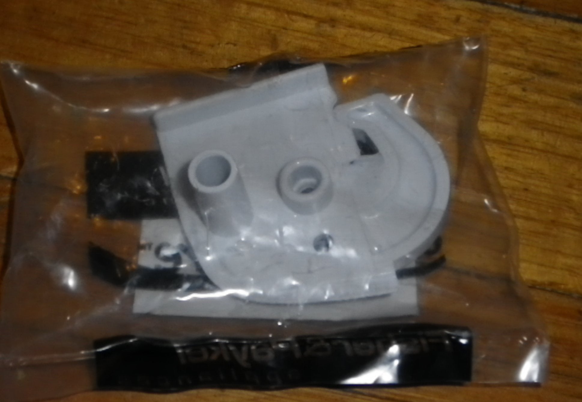 Fisher & Paykel Early White Left-Handed Door Closing Hook Stop for Refrigerators - Part Number FP842242