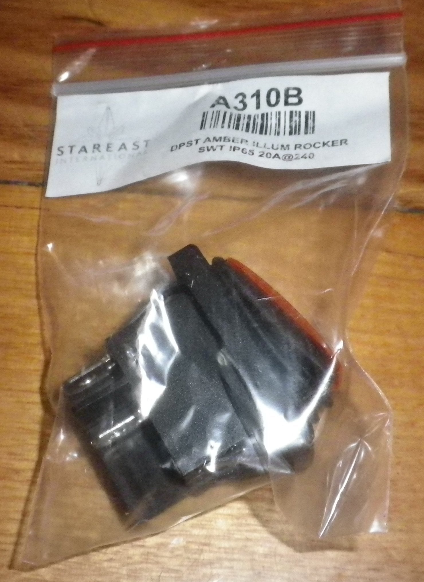 Universal Amber Illuminated DPST Mains Rocker Switch with Rubber Boot - A310B