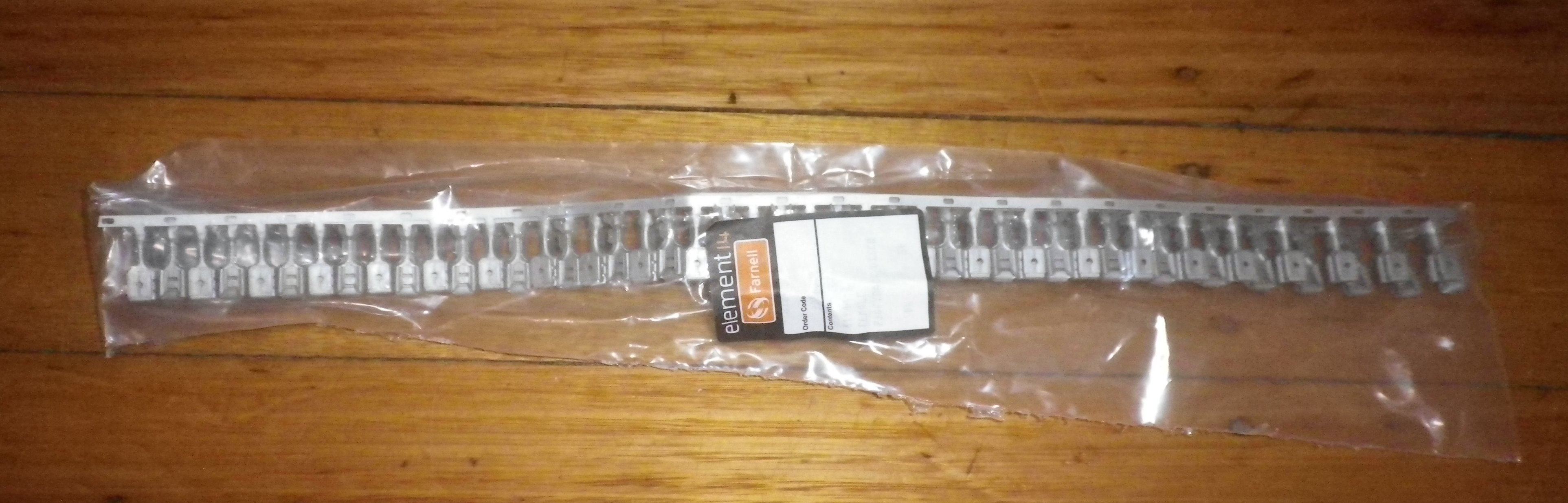 50-Piece Strip of 6.35mm Uninsulated Piggyback Spade Terminals - Part # 61944-2-50