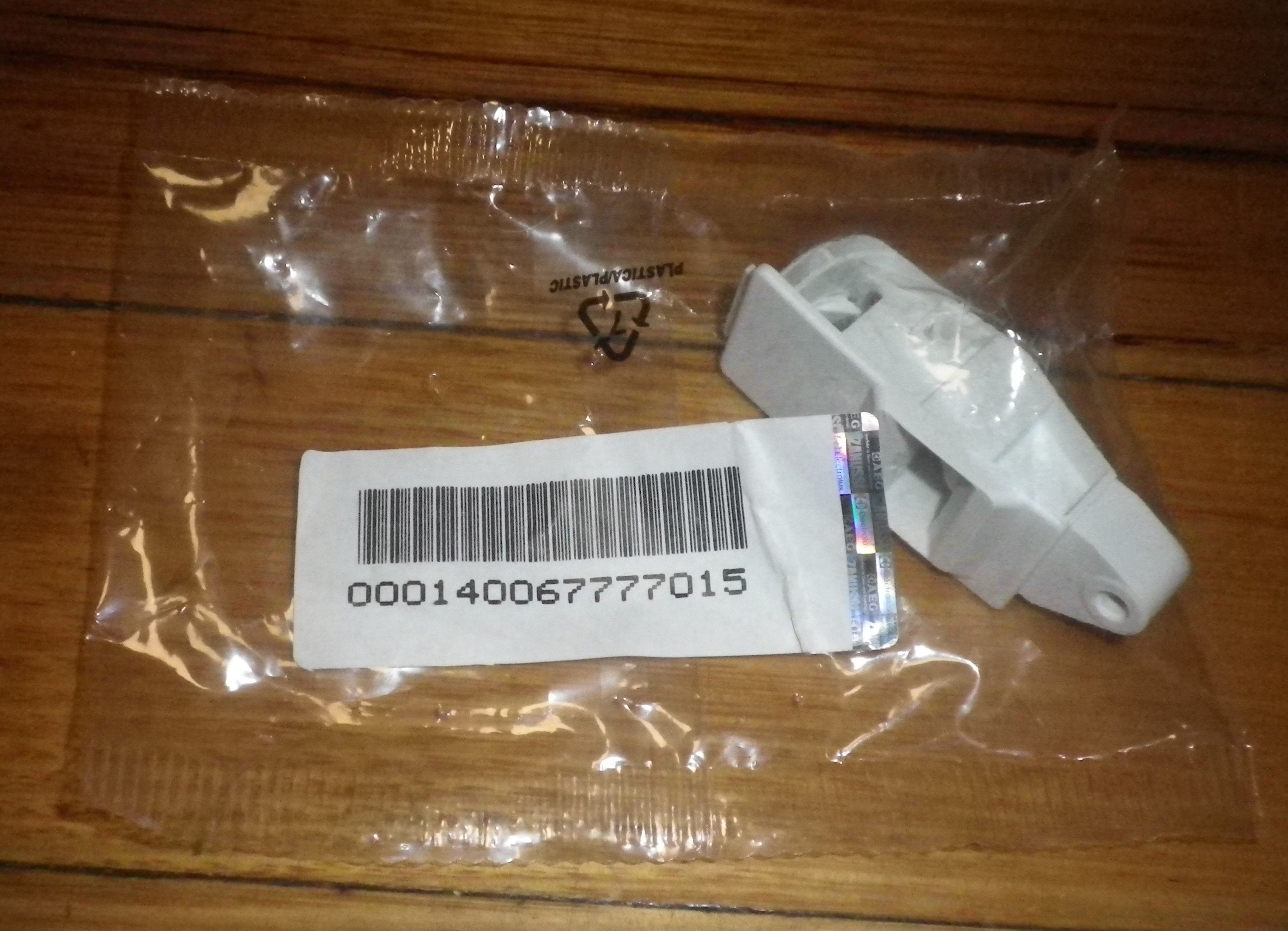 AEG 9-Kilogram Condenser Dryer Female Door Catch Assembly - Replacement Part # 140067777015