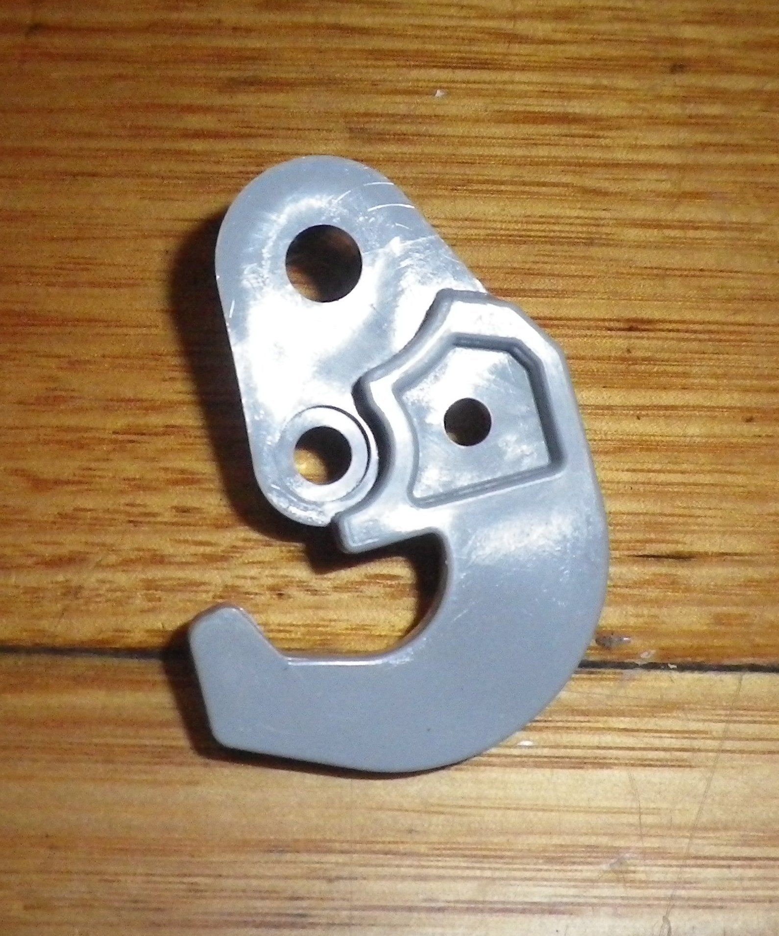 Fisher & Paykel 525 Series Grey Fridge Left-Hand Door Closing Hook - Part FP813574P