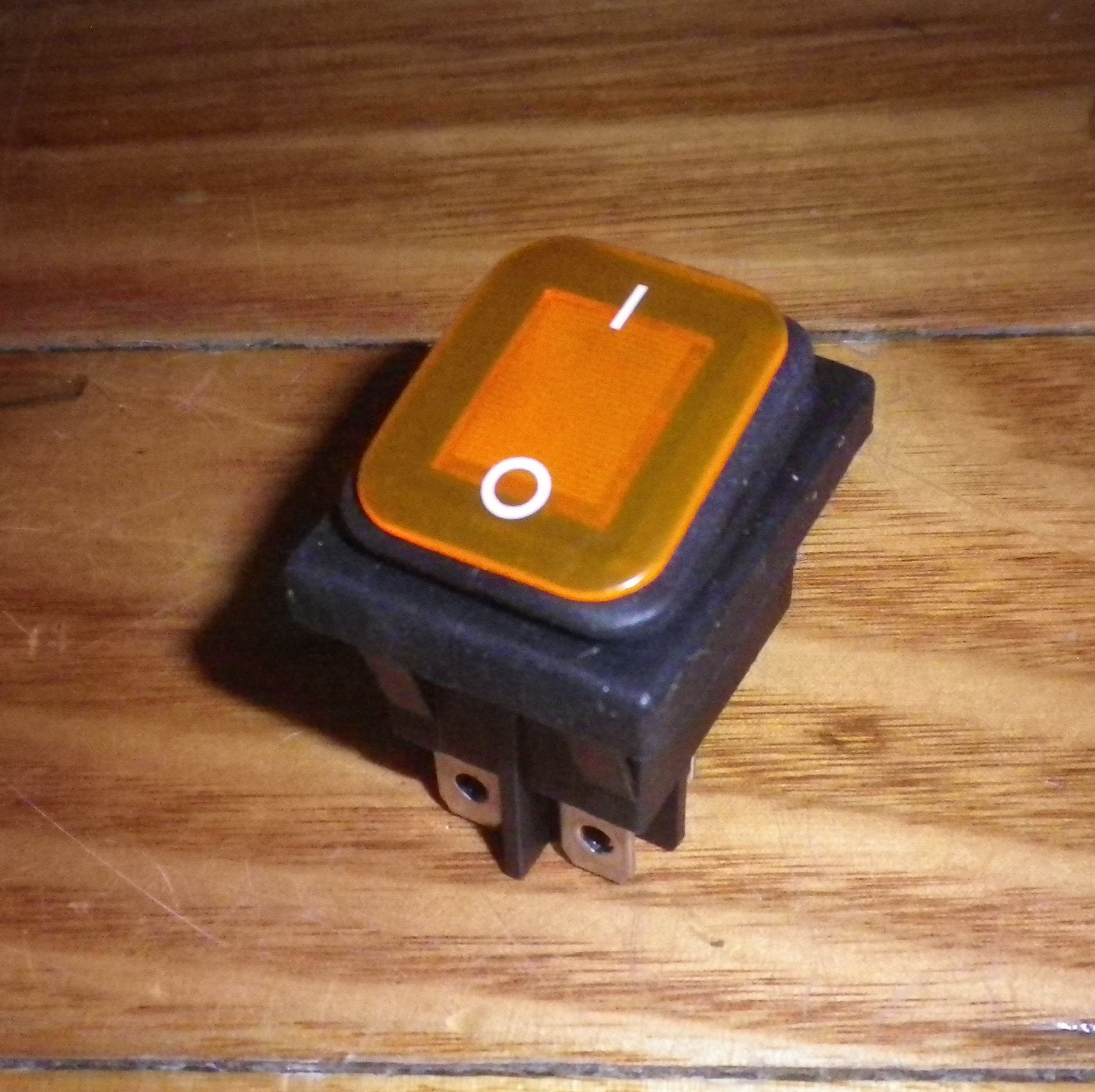 Universal Amber Illuminated DPST Mains Rocker Switch with Rubber Boot - A310B